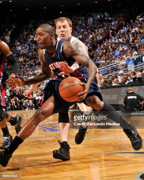 Jamal Crawford of the Atlanta Hawks drives against Jason Williams of the Orlando Magic in Game Two of the Eastern Conference Semifinals during the...