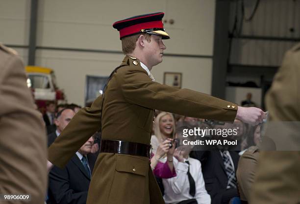 Prince Harry marches before the ceremony at the Army Aviation Centre on May 7, 2010 in Middle Wallop, England. The Prince of Wales, Colonel in Chief,...