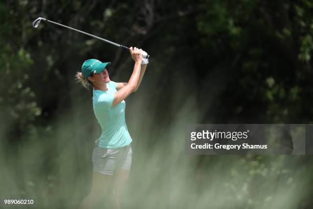 Jaye Marie Green watches her tee shot on the 17th hole during the final round of the 2018 KPMG PGA Championship at Kemper Lakes Golf Club on July 1,...