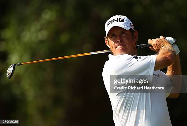 Lee Westwood of England plays his tee shot on the 12th hole during the second round of THE PLAYERS Championship held at THE PLAYERS Stadium course at...