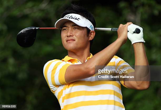 Ryuji Imada of Japan hits his tee shot on the fifth hole during the second round of THE PLAYERS Championship held at THE PLAYERS Stadium course at...