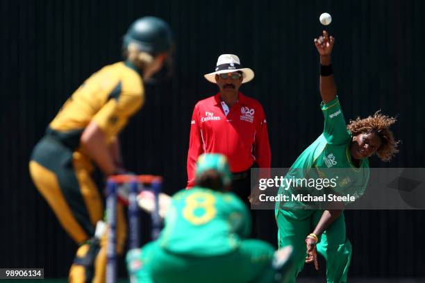 Marcia Letsoalo of South Africa bowls to Leah Poulton during the ICC T20 Women's World Cup Group A match between Australia and South Africa at Warner...