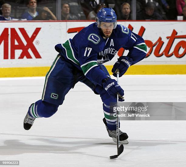 Ryan Kesler of the Vancouver Canucks skates up ice with the puck in Game Three of the Western Conference Semifinals against the Chicago Blackhawks...