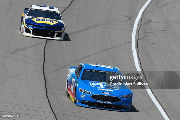 Ryan Blaney, driver of the PPG Ford, leads Chase Elliott, driver of the NAPA Auto Parts Chevrolet, during the Monster Energy NASCAR Cup Series...