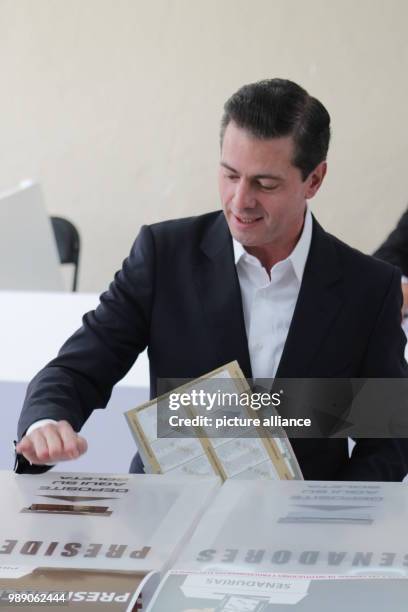 July 2018, Mexico, Mexico City: Enrique Pena Nieto, president of Mexico, voting in the election. Photo: Gerardo Vieyra/dpa