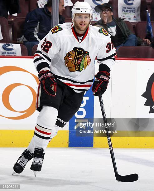 Kris Versteeg of the Chicago Blackhawks skates up ice in Game Three of the Western Conference Semifinals against the Vancouver Canucks during the...