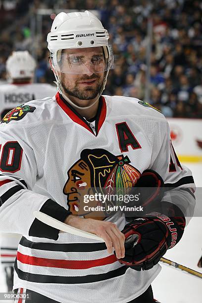 Patrick Sharp of the Chicago Blackhawks fixes the tape on his stick in Game Three of the Western Conference Semifinals against the Vancouver Canucks...