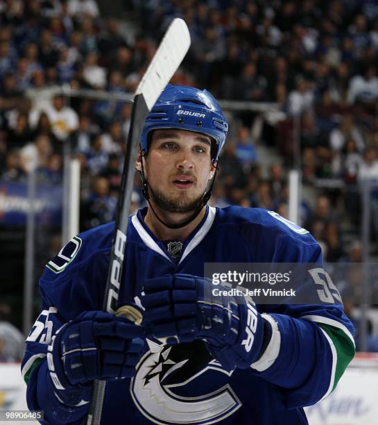 Shane O'Brien of the Vancouver Canucks looks on from the bench in Game Three of the Western Conference Semifinals against the Chicago Blackhawks...