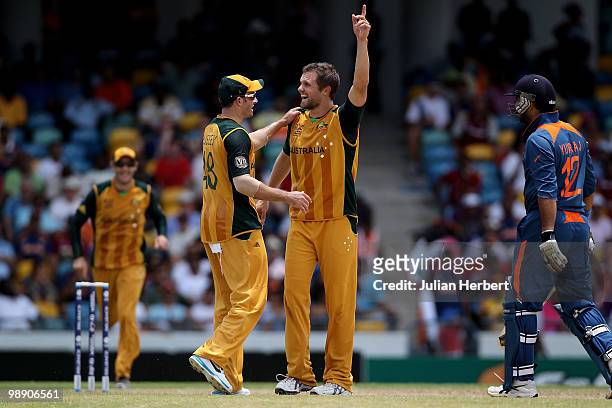 Mike Hussey of Australia congratullates Dirk Nannes after he bowled Yuvraj Singh during The ICC World Twenty20 Super Eight Match between Australia...