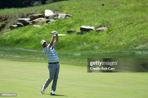 Marc Leishman of Australia plays a shot on the second hole during the final round of the Quicken Loans National at TPC Potomac on July 1, 2018 in...