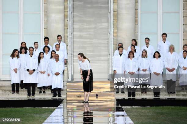 Designer Clare Waight Keller greets the audience on the runway during the Givenchy Haute Couture Fall Winter 2018/2019 show as part of Paris Fashion...