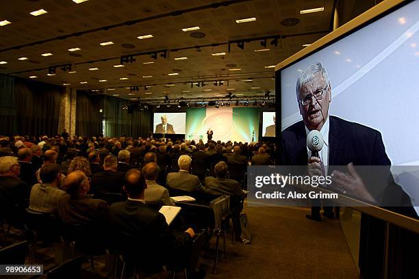 Theo Zwanziger, president of the German Football Association, is seen on a screen as he delivers his speech at the DFB South West Congress at the...