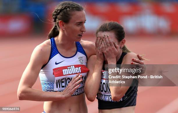 Laura Weightman of Great Britain comforts Sarah McDonald of Great Britain who finished third after winning the Women's 1500m Final during Day Two of...