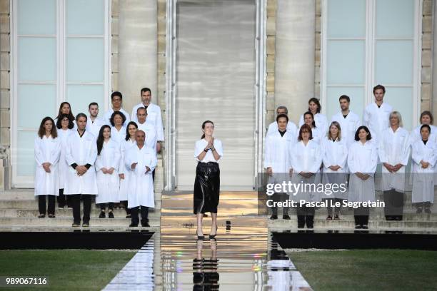 Designer Clare Waight Keller greets the audience on the runway during the Givenchy Haute Couture Fall Winter 2018/2019 show as part of Paris Fashion...