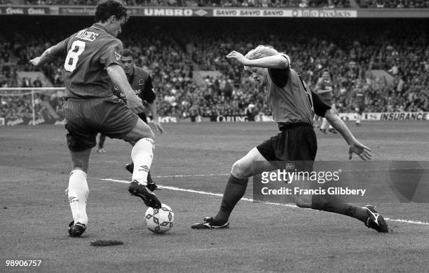 Mark Hughes of Chelsea runs with the ball during the FA Carling Premiership match between Chelsea and Blackburn Rovers held on May 5, 1996 at...