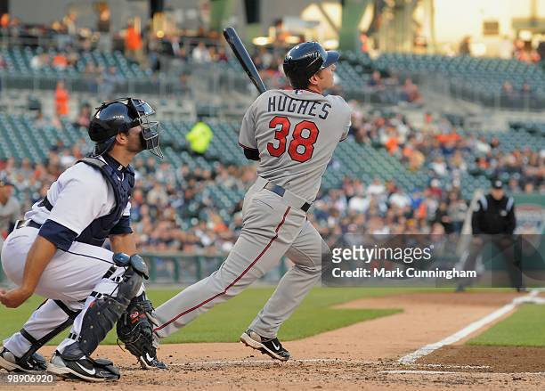 Luke Hughes of the Minnesota Twins hits a home run in his first major league at-bat during his major league debut game against the Detroit Tigers at...