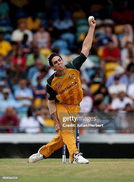 Mitchell Johnson of Australia bowls during The ICC World Twenty20 Super Eight Match between Australia and India played at The Kensington Oval on May...