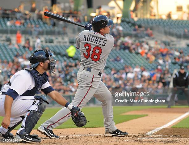 Luke Hughes of the Minnesota Twins hits a home run in his first major league at-bat during his major league debut game against the Detroit Tigers at...