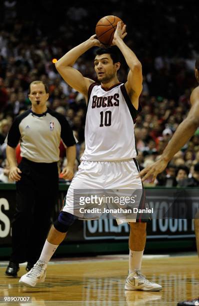 Carlos Delfino of the Milwaukee Bucks looks to pass against the Atlanta Hawks in Game Four of the Eastern Conference Quarterfinals during the 2010...