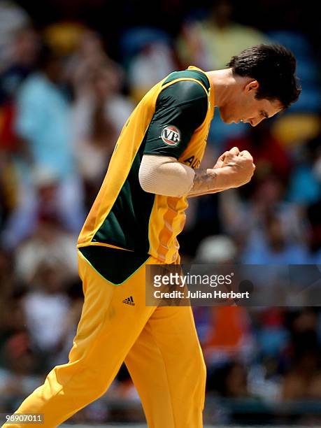 Mitchell Johnson of Australia celebrates the wicket of Yusuf Pathan during The ICC World Twenty20 Super Eight Match between Australia and India...