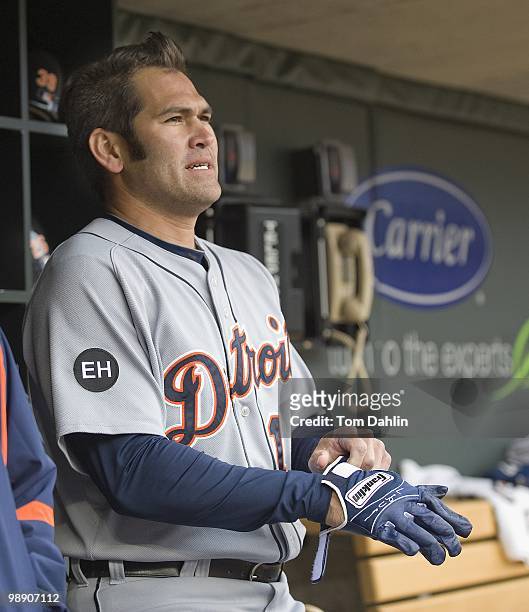 Johnny Damon of the Detroit Tigers puts on his batting gloves prior to a game against the Minnesota Twins at Target Field on May 5, 2010 in...