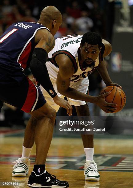 John Salmons of the Milwaukee Bucks looks to move against Maurice Evans of the Atlanta Hawks in Game Four of the Eastern Conference Quarterfinals...