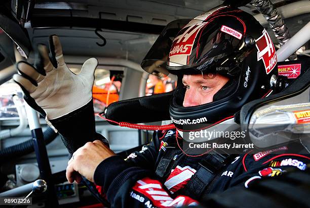 Ryan Newman, driver of the Haas Automation Chevrolet, adjusts his gloves dduring practice for the NASCAR Sprint Cup Series Showtime Southern 500 at...