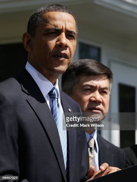 President Barack Obama speaks about jobs while flanked by Secretary of Commerce Gary Locke at the White House on May 7, 2010 inWashington, DC....
