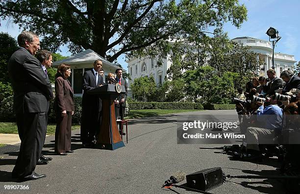 President Barack Obama speaks about jobs while flanked by Director of the National Economic Council Larry Summers , Treasury Secretary Timothy...