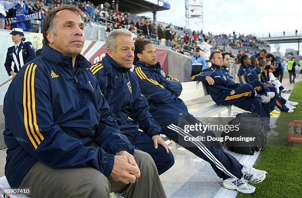 Head Coach Bruce Arena, Associate Head Coach Dave Sarachan and Assistant Coach Cobi Jones the Los Angeles Galaxy look on from the sidelines as the...