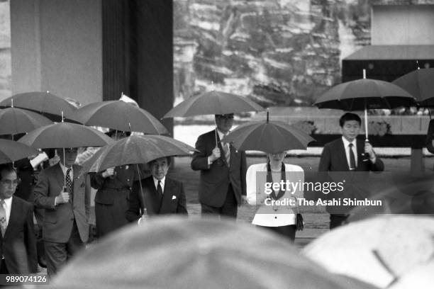 Crown Prince Akihito and Crown Princess Michiko are seen after visitng the Memorial for the victims of the Battle of Okinawa at the Okinawa Peace...