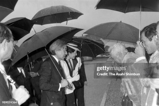 Crown Prince Akihito and Crown Princess Michiko are seen after visitng the Memorial for the victims of the Battle of Okinawa at the Okinawa Peace...