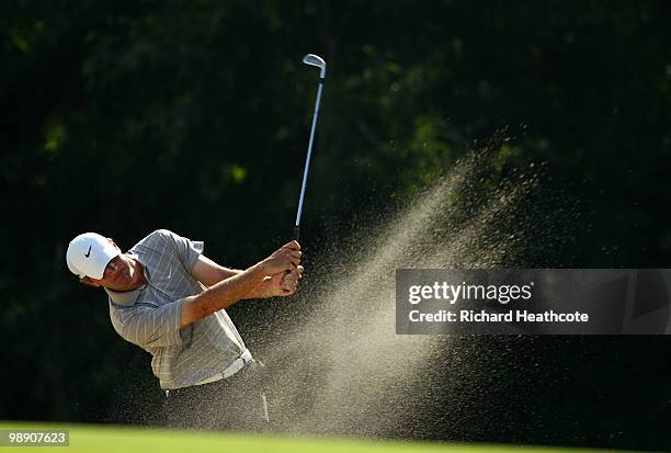 Lucas Glover plays from a fairway bunker on the 14th hole during the second round of THE PLAYERS Championship held at THE PLAYERS Stadium course at...