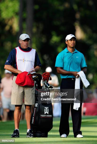 Tiger Woods waits on the tenth fairway with caddie Steve Williams during the second round of THE PLAYERS Championship held at THE PLAYERS Stadium...