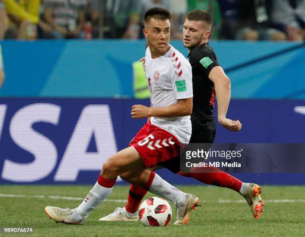 Ante Rebic of Croatia national team and Jonas Knudsen of Denmark national team vie for the ball during the 2018 FIFA World Cup Russia Round of 16...