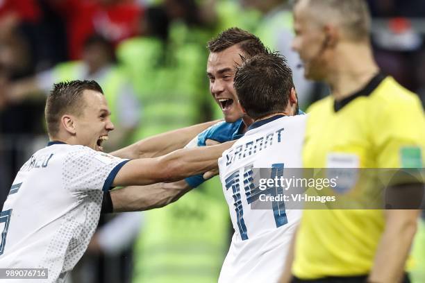 Denis Cheryshev of Russia, goalkeeper Igor Akinfeev of Russia, Vladimir Granat of Russia during the 2018 FIFA World Cup Russia round of 16 match...