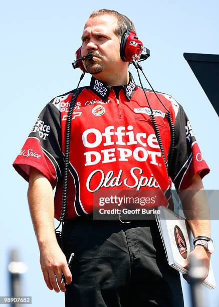 Darian Grubb, crew chief for the Old Spice / Office Depot Chevrolet, watches from atop the team hauler during practice for the NASCAR Sprint Cup...