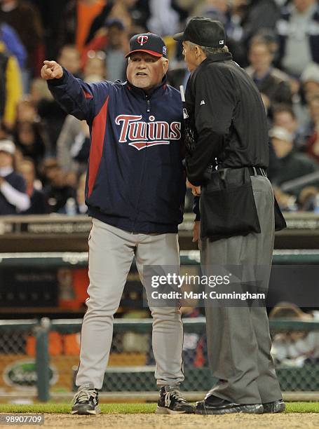 Manager Ron Gardenhire of the Minnesota Twins argues a call with home plate umpire Gary Darling during the game against the Detroit Tigers at...