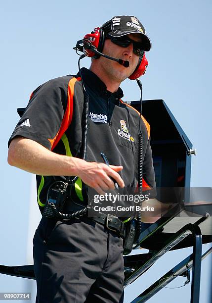 Alan Gustafson, crew chief for the GoDaddy.com Chevrolet, watches from atop the team hauler during practice for the NASCAR Sprint Cup Series SHOWTIME...