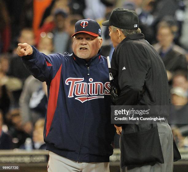 Manager Ron Gardenhire of the Minnesota Twins argues a call with home plate umpire Gary Darling during the game against the Detroit Tigers at...