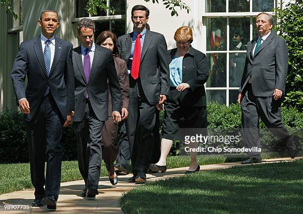 President Barack Obama leads members of his economics team Treasury Secretary Timothy Geithner, Labor Secretary Hilda Solis, Office of Management and...