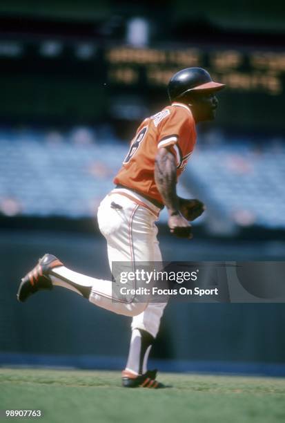 Second baseman Joe Morgan of the San Francisco Giants watches the flight of his ball as he hustle down the first baseline circa 1982 during a Major...