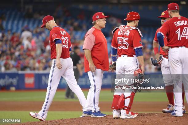 Happ of the Toronto Blue Jays exits the game as he is relieved by manager John Gibbons in the sixth inning during MLB game action against the Detroit...