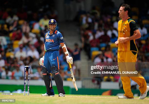 Indian batsman Ashish Nehra is bowled out by Australian bowler Shaun Tait during the ICC World Twenty20 Super Eight match between Australia and India...