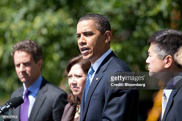 President Barack Obama makes a statement on the economy at the White House with Timothy Geithner, U.S. Treasury secretary, from left, Hilda Solis,...