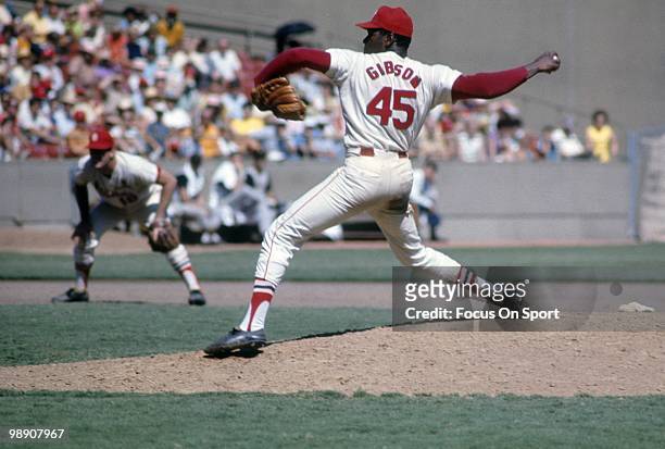 S: Pitcher Bob Gibson of the St. Louis Cardinals pitches circa late 1960's during a Major League Baseball game at Busch Stadium in St. Louis,...