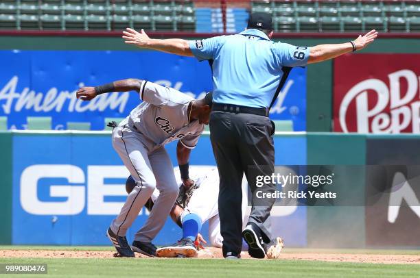 Marty Foster umpire calls Rougned Odor of the Texas Rangers safe on second base against Tim Anderson of the Chicago White Sox at Globe Life Park in...