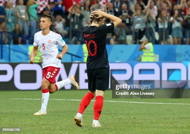 Luka Modric of Croatia looks dejected after missing a penalty during the 2018 FIFA World Cup Russia Round of 16 match between Croatia and Denmark at...