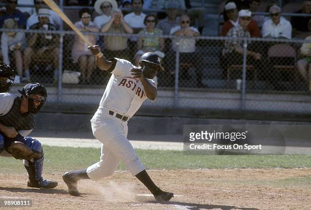 Second baseman Joe Morgan of the Houston Astros swings and watches the flight of his ball circa late 1960's during a Major League Baseball game....