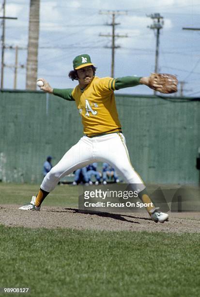 S: Pitcher Jim Catfish Hunter of the Oakland Athletics pitches during a circa early 1970's spring training Major League baseball game in Scottsdale,...